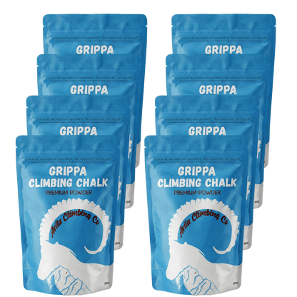 Multiple packages of Grippa Premium Climbing Chalk on a white background