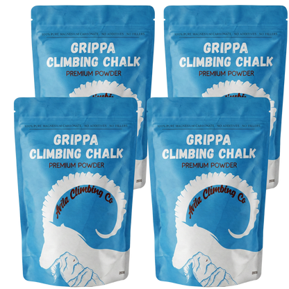 Four packages of Grippa Climbing Chalk on a white background